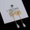 Gold Tassel Pearl Clip-On Earrings